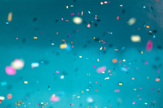 Blue background with confetti